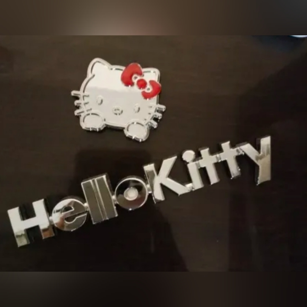 Hello Kitty car or laptop emblem with adhesive back.  SHIPPING AVAIL…